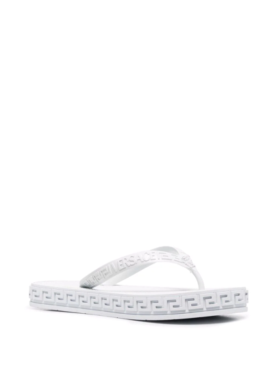 Shop Versace Greca-debossed Flip Flops In Weiss