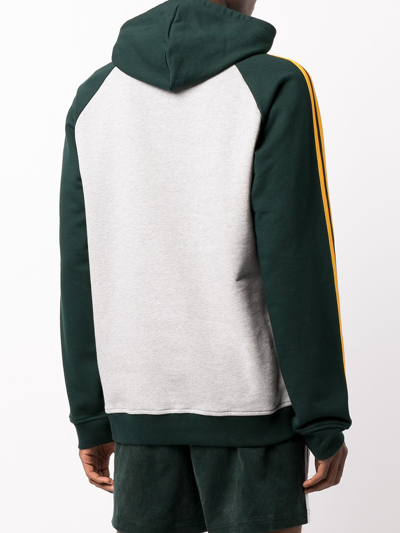 Shop Adidas Originals X Noah Three-stripe Hoodie In Green