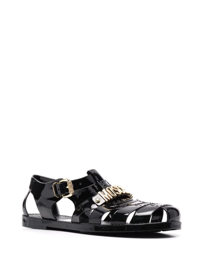 Shop Moschino Logo-plaque Detail Sandals In Black