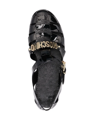 Shop Moschino Logo-plaque Detail Sandals In Black