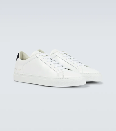 Shop Common Projects Retro Low Leather Sneakers In White/black