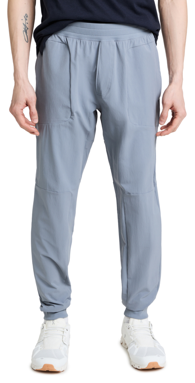 Shop Alo Yoga Co-op Pants In Steel Blue