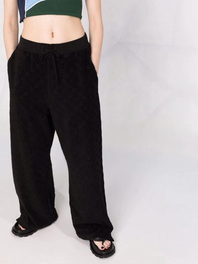 Shop Ambush Monogram Jacquard Wide-leg Trousers In Black