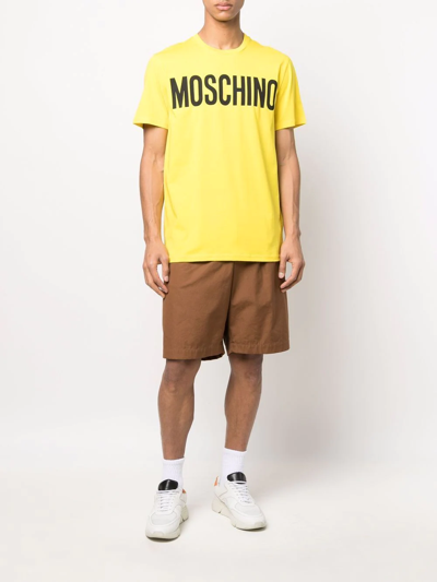 Shop Moschino Logo-print T-shirt In Yellow