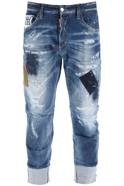 Shop Dsquared2 Distressed Effect Logo Detailed Cropped Jeans In Blue