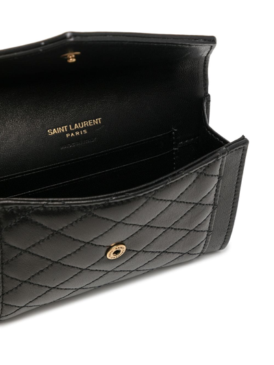Shop Saint Laurent Logo-plaque Quilted Clutch Bag In Black