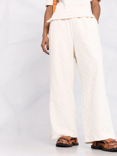 Shop Ambush Monogram-pattern Terrycloth Wide-leg Trousers In Neutrals