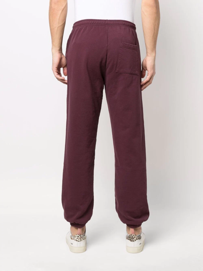 Shop Sporty And Rich Logo-print Cotton Track Pants In Red