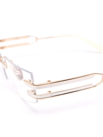 Shop Balmain Eyewear Fixe Rimless Glasses In Gold