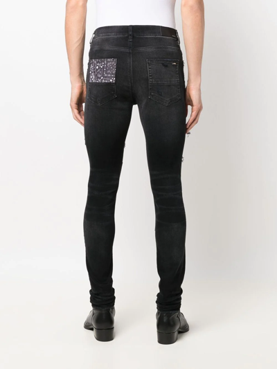 Shop Amiri Bandana-print Skinny Jeans In Black