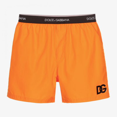 Shop Dolce & Gabbana Teen Boys Orange Swim Shorts