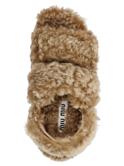 Shop Miu Miu Shearling Sandals In Brown