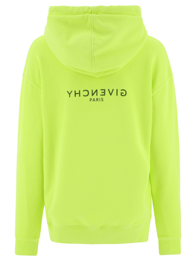Shop Givenchy "reverse" Hoodie In Yellow