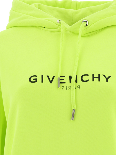 Shop Givenchy "reverse" Hoodie In Yellow