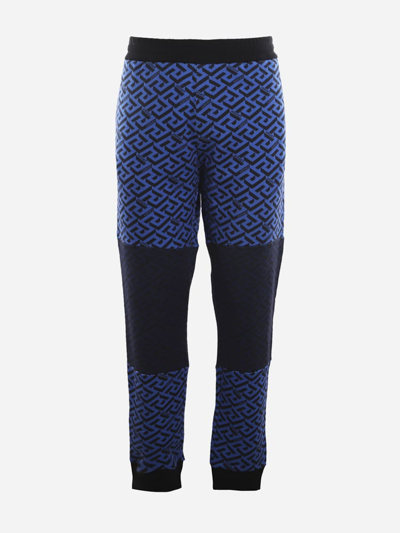 Shop Versace Cotton Trousers With La Greca Print In Blue