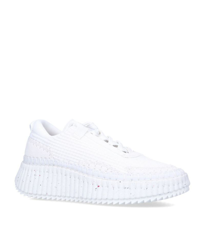 Shop Chloé Nama Runner Sneakers In White
