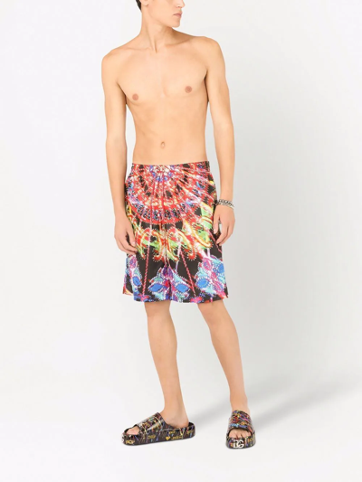 Dolce & Gabbana Illumination Print Swim Shorts In Black
