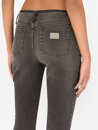 Shop Dolce & Gabbana Raw-cut Skinny Jeans In Black