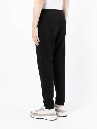 Shop Emporio Armani Embroidered Logo Cotton Track Trousers In Black