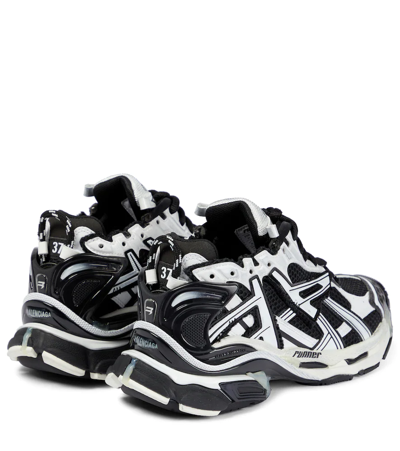 Shop Balenciaga Runner Sneakers In White/black