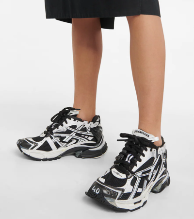Shop Balenciaga Runner Sneakers In White/black