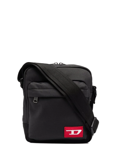 Shop Diesel Logo-patch Messenger Bag In Schwarz