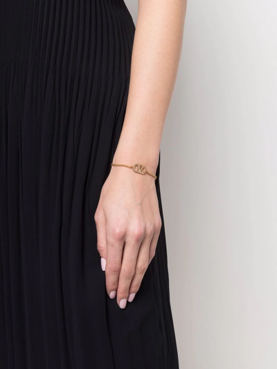 Shop Valentino Vlogo Crystal-embellished Bracelet In Gold