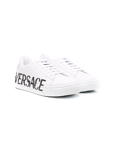Shop Versace Logo-stamp Leather Trainers In White