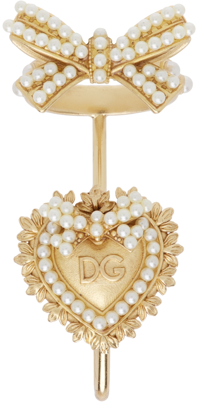 Shop Dolce & Gabbana Gold Sacred Heart 'dg' Crossed Logo Finger Ring In Zoo00 Gold