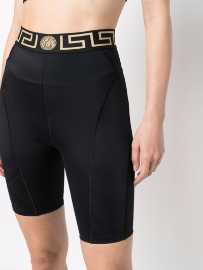 Shop Versace Shorts Sportivi Con Greca In Black