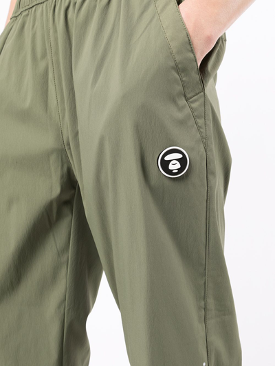 Shop Aape By A Bathing Ape Logo-patch Tapered Trousers In Grün