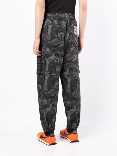 Shop Aape By A Bathing Ape Camo-print Tapered Trousers In Schwarz