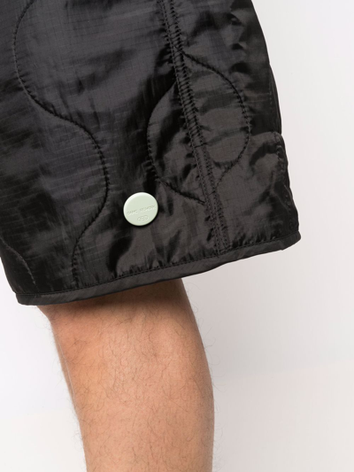 Shop Oamc Embroidered-logo Quilted Shorts In Schwarz
