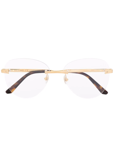 Shop Cartier Round-frame Glasses In Gold