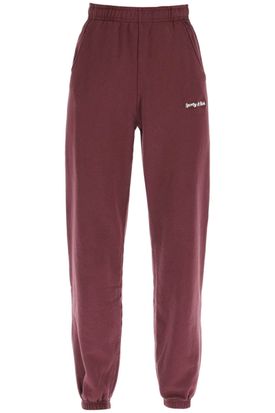 Shop Sporty And Rich Logo Embroidery Sweatpants In Red,purple