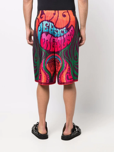 Shop Versace Logo-print Pleated Shorts In Orange