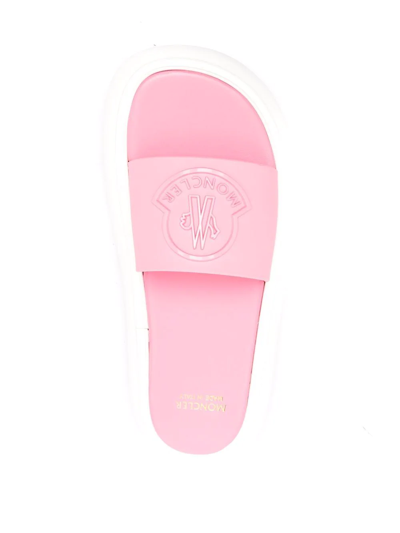 Shop Moncler Debossed-logo Leather Slides In Rosa