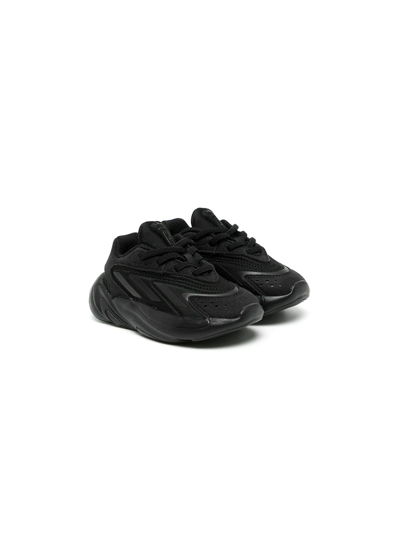 Shop Adidas Originals Ozelia Low Top Sneakers In Black