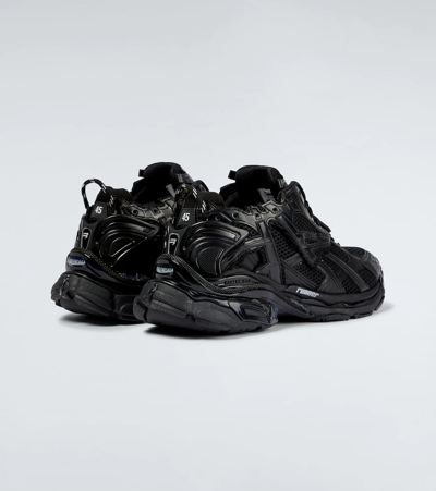 Shop Balenciaga Runner Sneakers In Black