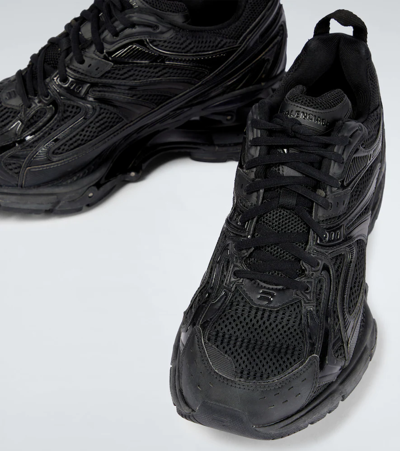 Shop Balenciaga X-pander Sneakers In Black