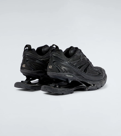 Shop Balenciaga X-pander Sneakers In Black