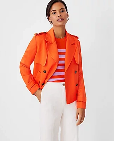 Shop Ann Taylor Twill Swing Trench Coat In Orange Spark