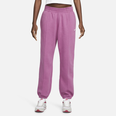 Shop Nike Women's  Sportswear Essential Collection Fleece Pants In Purple