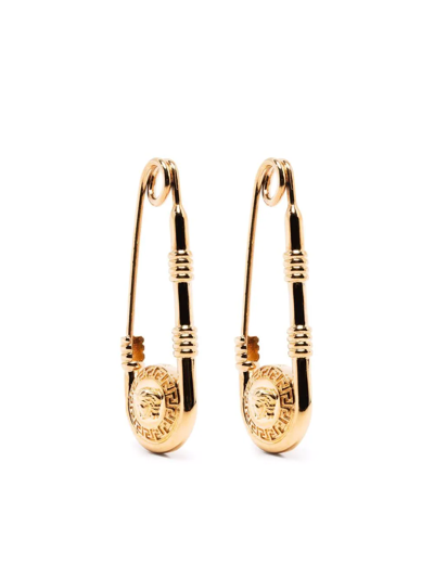 Shop Versace Safety-pin Medusa Earrings In Gold