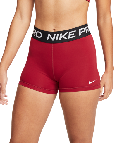 Shop Nike Pro Women's Dri-fit Shorts In Pomegranate