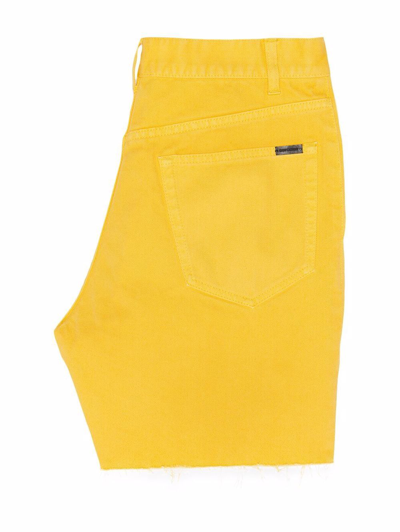 Shop Saint Laurent Mid-rise Denim Shorts In Yellow