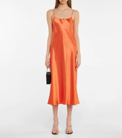 Shop Vince Satin Slip Dress In 橙色