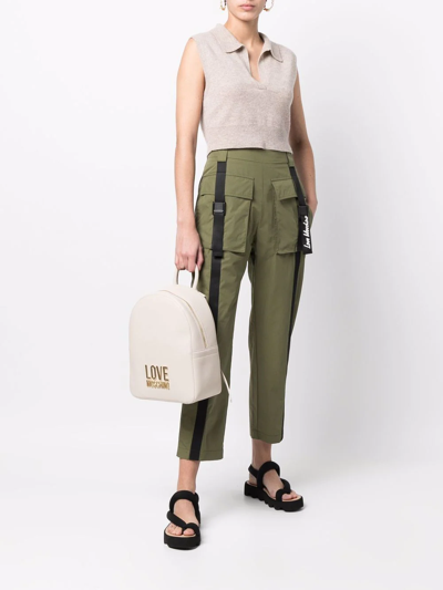 Shop Love Moschino Flap-pockets Cotton-blend Parachute Trousers In Green