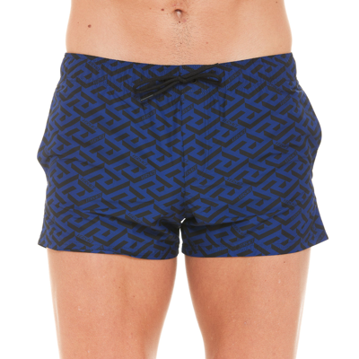 Shop Versace Greca Logo Printed Drawstring Swim Shorts In Navy