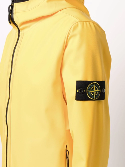 Shop Stone Island Compass-patch Hooded Jacket In Gelb